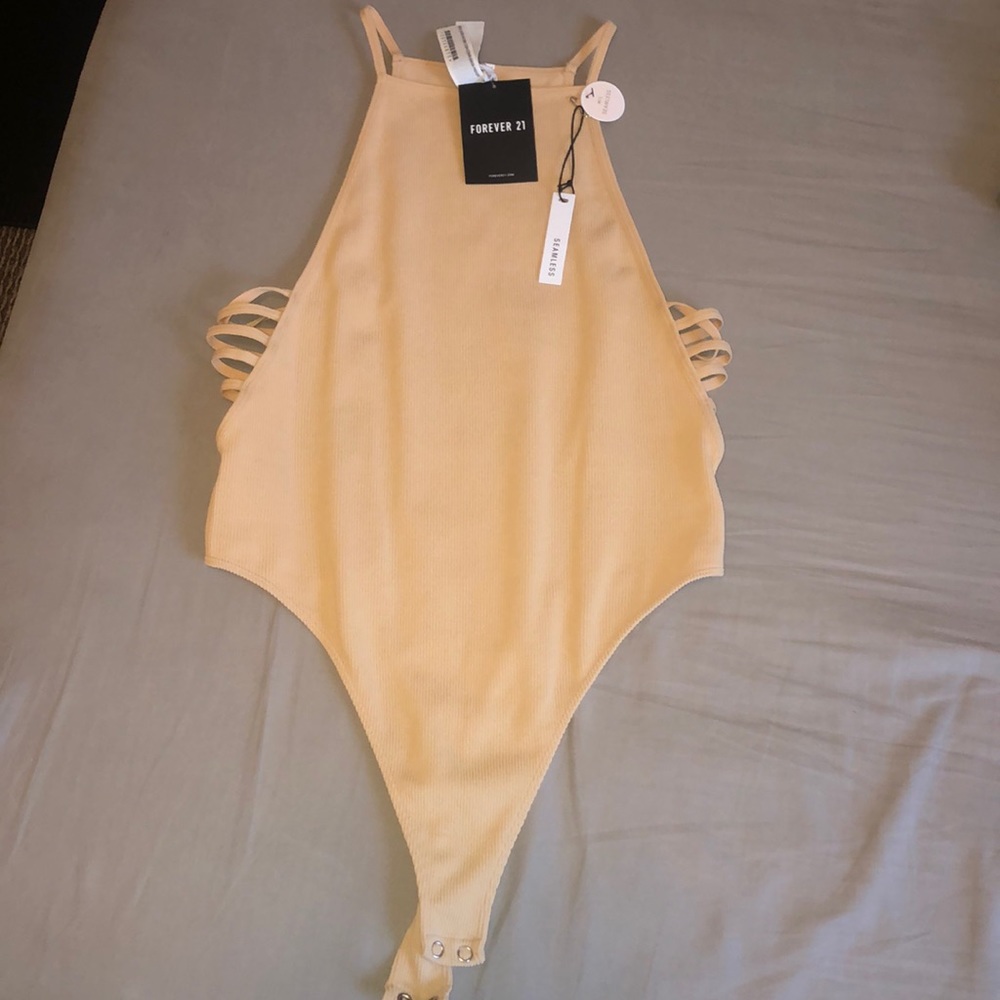 Forever 21 tan body suit, never worn